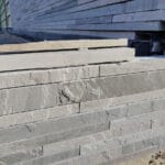 Indian Natural Stones Kandla grey sandstone paving with natural textured surface and elegant grey tones, ideal for outdoor patios, pathways, and landscaping applications.