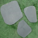 Indian Natural Stones basalt stepping stones with natural dark grey finish, ideal for garden pathways, landscaping, and outdoor decorative stone applications.