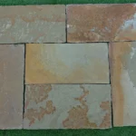 Indian Natural Stones Kota honey limestone paving slabs with natural texture for outdoor flooring and landscape applications.