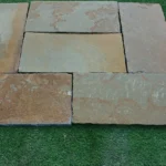 Indian Natural Stones Kota honey limestone paving slabs with natural texture for outdoor flooring and landscape applications.