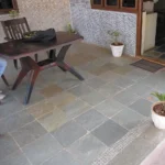 Indian Natural Stones Lime Green limestone with natural textured surface for flooring, wall cladding, and paving applications.