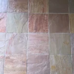 Indian Natural Stones Lime Pink limestone with natural textured surface for flooring, wall cladding, and architectural stone applications.