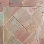 Indian Natural Stones Lime Pink limestone with natural textured surface for flooring, wall cladding, and architectural stone applications.