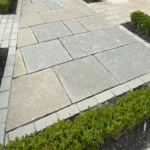 Indian Natural Stones Tandur Yellow limestone with natural textured finish for outdoor flooring, paving, and architectural wall cladding applications.
