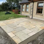 Indian Natural Stones Tandur Yellow limestone with natural textured finish for outdoor flooring, paving, and wall cladding applications.