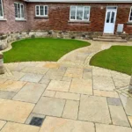 Indian Natural Stones Tandur Yellow limestone with natural textured finish for outdoor garden flooring.