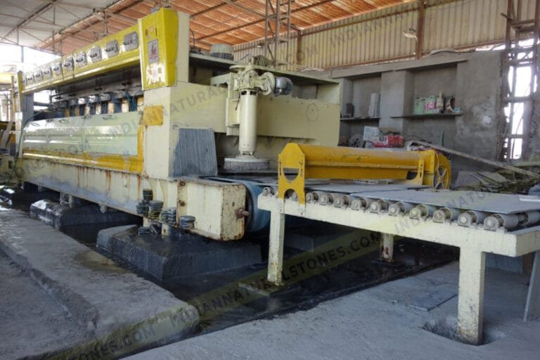Natural stone processing and polishing machine at Indian Natural Stones manufacturing facility
