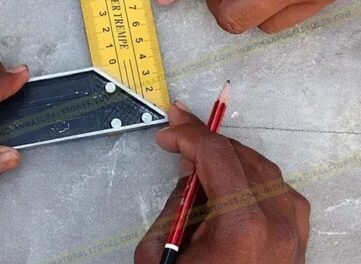 Quality control and precision measurement of natural stone tiles by skilled technicians at Indian Natural Stones, ensuring accurate sizing and high manufacturing standards