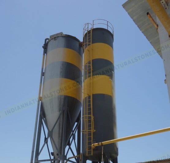 2.JPG Industrial storage silos and material handling infrastructure at Indian Natural Stones factory supporting efficient natural stone manufacturing and processing operations.