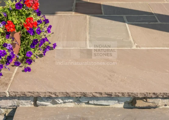 Premium Autumn Brown Indian Sandstone paving from Indian Natural Stones used for elegant patio landscaping.
