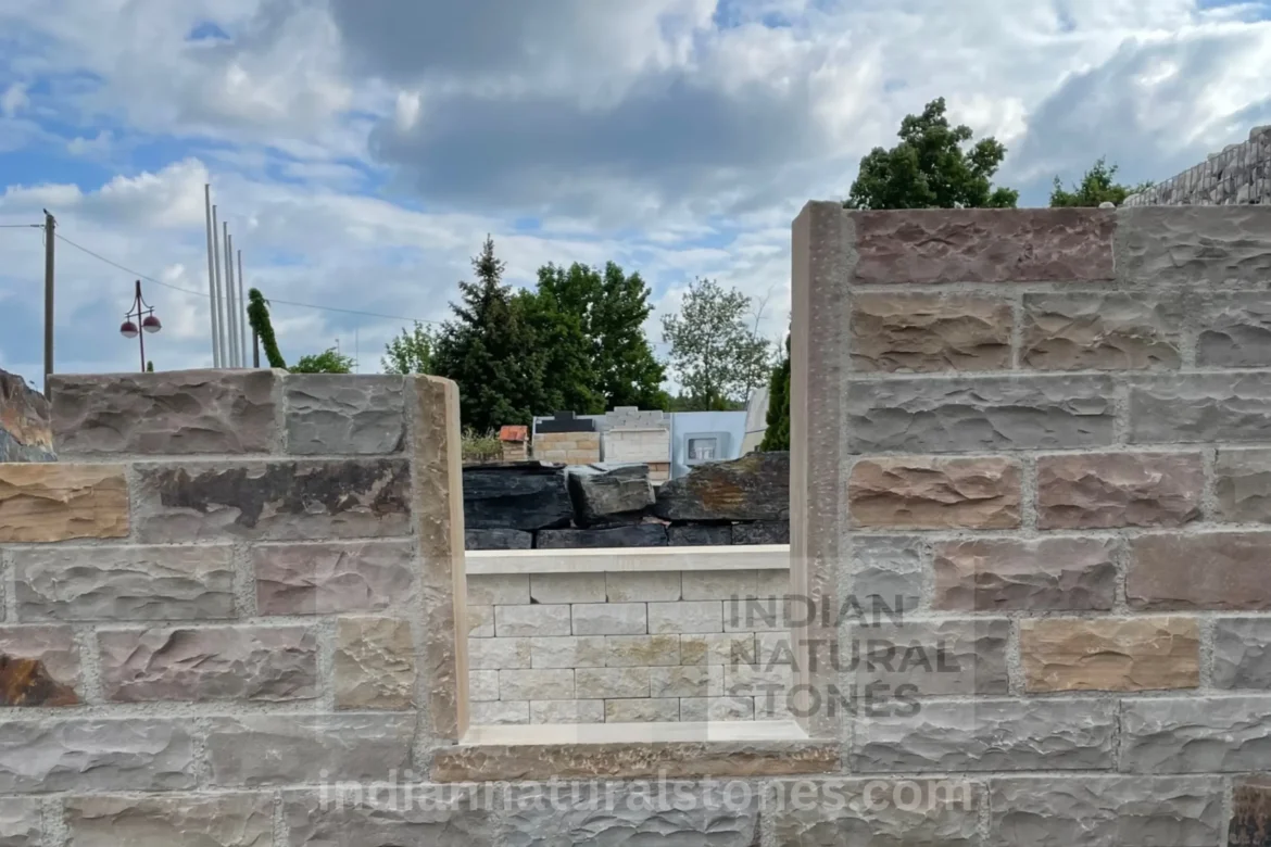Autumn Brown Indian Sandstone wall cladding in a contemporary outdoor, showcasing natural color variation and durability by Indian Natural Stones.