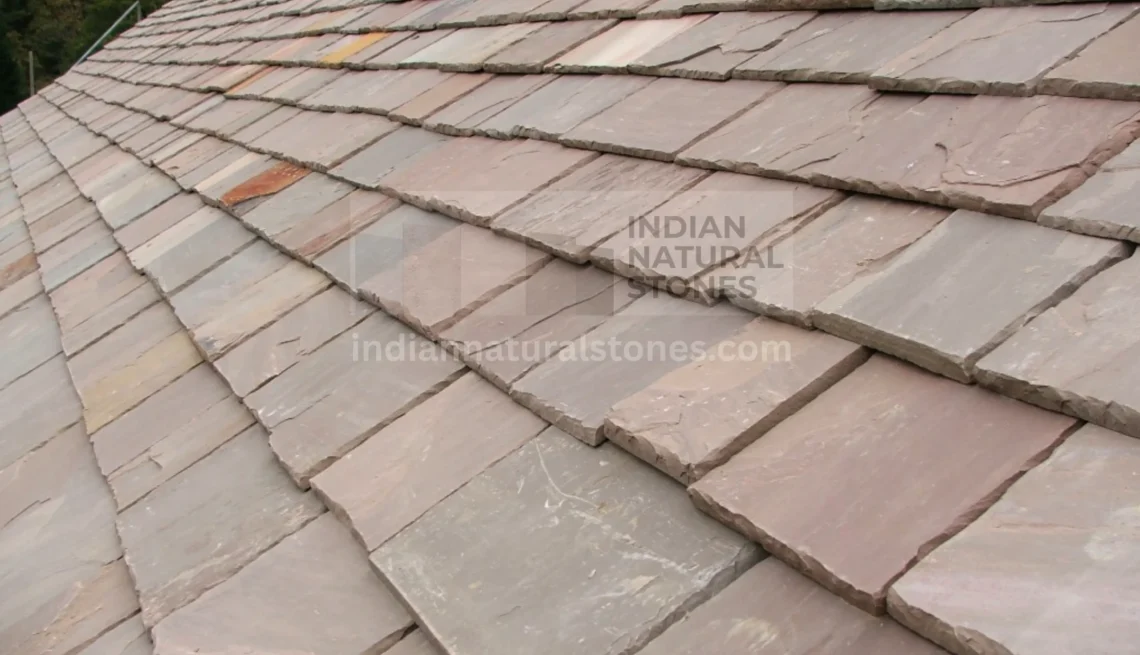 Autumn Brown Indian Sandstone roof tiles installed in overlapping pattern, showcasing natural earthy tones and durability, supplied by Indian Natural Stones.