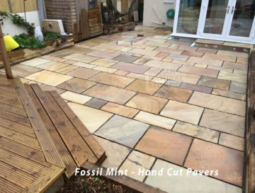 Hand-cut Fossil Mint paving from Indian Natural Stones creating a durable and attractive outdoor patio setting.