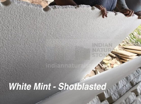 Indian sandstone slab with hand-cut natural texture and calibrated finish showcased by Indian Natural Stones