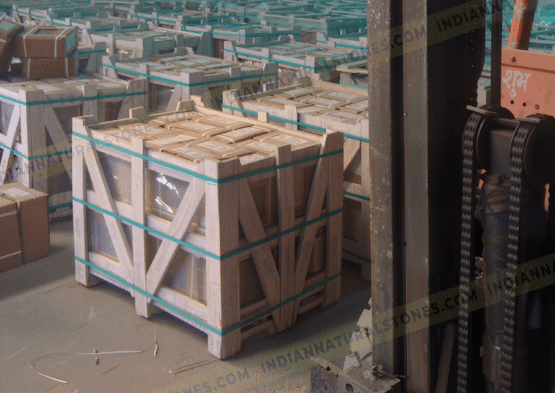 Secure wooden crate packaging of natural stone products at Indian Natural Stones warehouse, prepared for export and international shipping