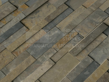 Premium Indian slate ledger panels with natural split-face texture and multi-tone color variation supplied by Indian Natural Stones for feature walls and architectural cladding.