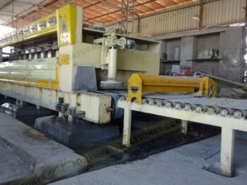 Natural stone processing and polishing machine at Indian Natural Stones manufacturing facility