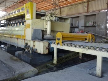 Natural stone processing and polishing machine at Indian Natural Stones manufacturing facility