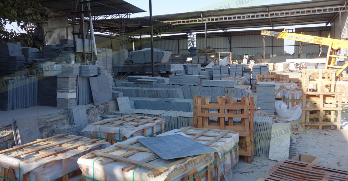 north-factory-scaled (1) Natural stone slabs and packed crates at Indian Natural Stones north factory for processing, storage, and export operations