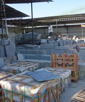 north-factory-scaled (1) Natural stone slabs and packed crates at Indian Natural Stones north factory for processing, storage, and export operations