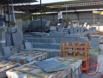 north-factory-scaled-1-1024x683-1-2280x1520x0x222x2280x1076x1768381174 Natural stone slabs and packed crates at Indian Natural Stones north factory for processing, storage, and export operations