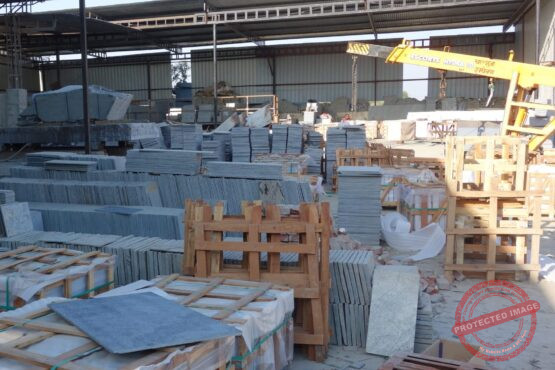 north-factory-scaled Natural stone slabs and packed crates at Indian Natural Stones north factory for processing, storage, and export operations