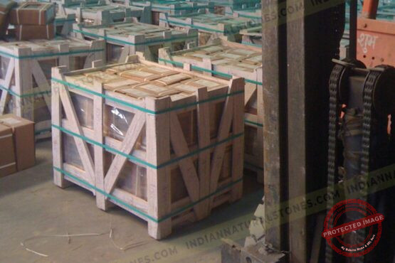 Secure wooden crate packaging of natural stone products at Indian Natural Stones warehouse, prepared for export and international shipping