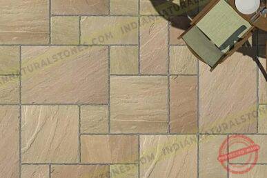 sandstone Sandstone paving tiles installed in a patio layout by Indian Natural Stone, showcasing natural color variation, textured finish, and durable outdoor stone flooring design.