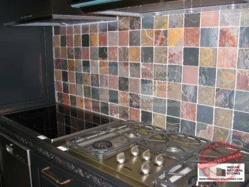slates from Indian natural stones exporter Colorful Indian slate tiles used as kitchen backsplash showcasing natural stone variation