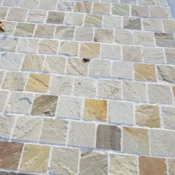 Natural fossil mint sandstone cobblestone paving in random pattern for outdoor flooring by Indian Natural Stones.