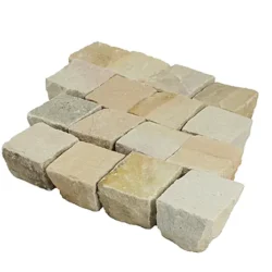 Mint sandstone cobblestone pavers in light beige tones with natural texture for outdoor paving by Indian Natural Stones.