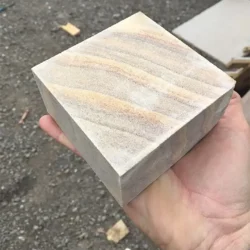 Natural rainbow sandstone cobblestone block with smooth finish for paving by Indian Natural Stones.