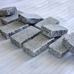 Tandur blue natural stone paving slabs with textured surface for outdoor flooring and patios by Indian Natural Stones