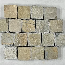 Natural Tandur yellow limestone cobblestone pavers with rough texture for outdoor paving by Indian Natural Stones.