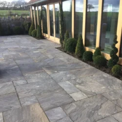 Black sandstone natural stone paving slabs for outdoor patio and walkway landscaping by Indian Natural Stones
