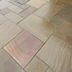 Raj Green sandstone natural stone paving patio with mixed size slabs by Indian Natural Stones