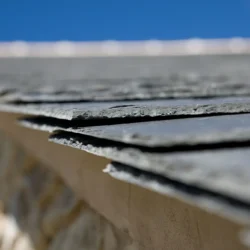 Scalloped slate roofing tiles in overlapping pattern by Indian Natural Stones