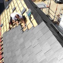 Natural slate roofing tile installation with mechanical fixing on roof structure by Indian Natural Stones