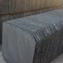 Stacked slate roofing tiles with uniform shape and finish by Indian Natural Stones