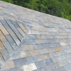 Multicolor slate roofing tiles installed on sloped roof by Indian Natural Stones
