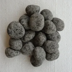 Black Beauty Granite Pebbles by Indian Natural Stones for modern outdoor spaces
