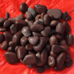 Chocolate Slate Pebbles by Indian Natural Stones for modern outdoor spaces