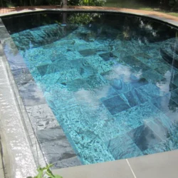 Premium outdoor swimming pool tile solutions by Indian Natural Stones for modern architecture
