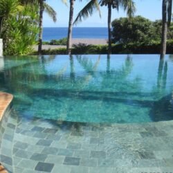 Indian Natural Stones Lime Green limestone with natural textured surface for swimming pool flooring applications.