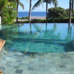 Indian Natural Stones Lime Green limestone with natural textured surface for swimming pool flooring applications.