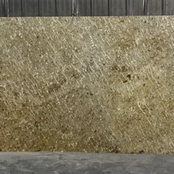 Green Gold veneer sheet with organic surface detailing and natural stone finish by Indian Natural Stones
