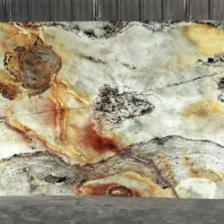 Indian Autumn flexible stone veneer sheet featuring dramatic natural patterns and warm earthy tones by Indian Natural Stones