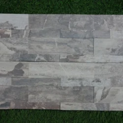 3D peel and stick stone panels by Indian Natural Stones in Silver Shine Gold finish, featuring a natural textured stacked stone design for elegant and easy wall cladding.